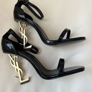 Yves Saint Laurent Black Heels with Gold Logo